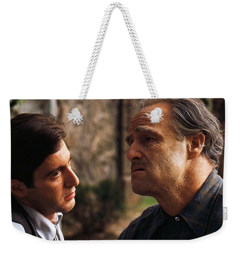Al Pacino Marlon Brando The Godfather Publicity Photo 1972 Weekender Tote Bag featuring the photograph Al Pacino Marlon Brando The Godfather publicity photo 1972 by David Lee Guss
