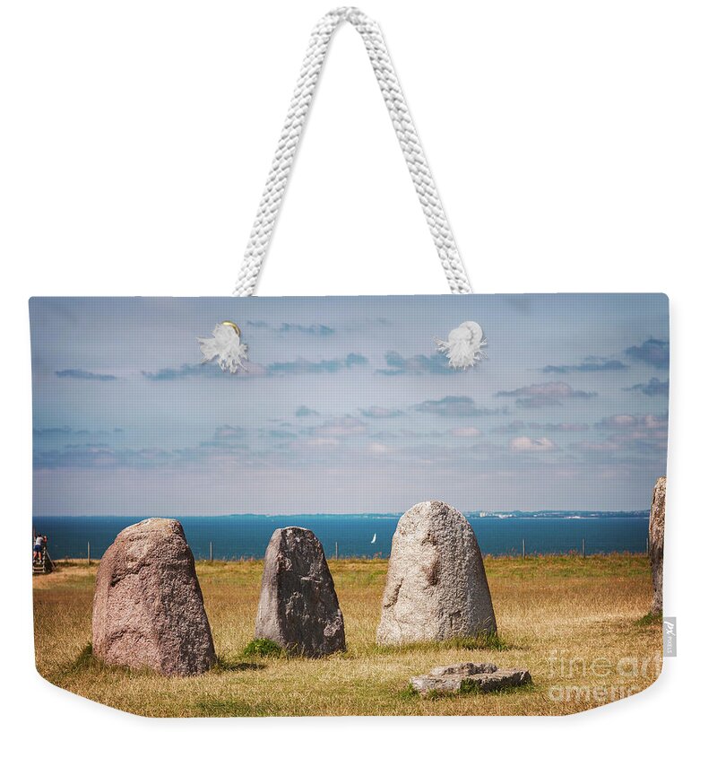 Megalithic Weekender Tote Bag featuring the photograph Ales megalithic standing stones by Sophie McAulay