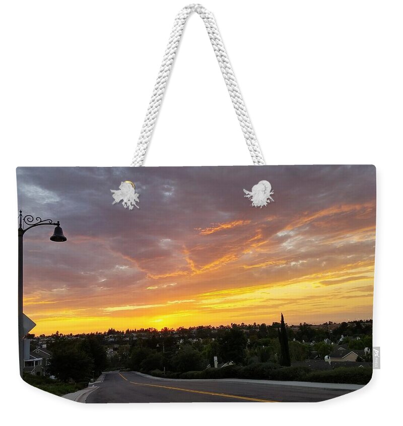 Cloud Weekender Tote Bag featuring the photograph Colorful Sunset in Mission Viejo by J R Yates