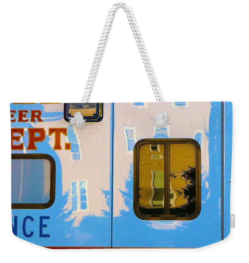  Weekender Tote Bag featuring the photograph Ambulance Reflections by Polly Castor