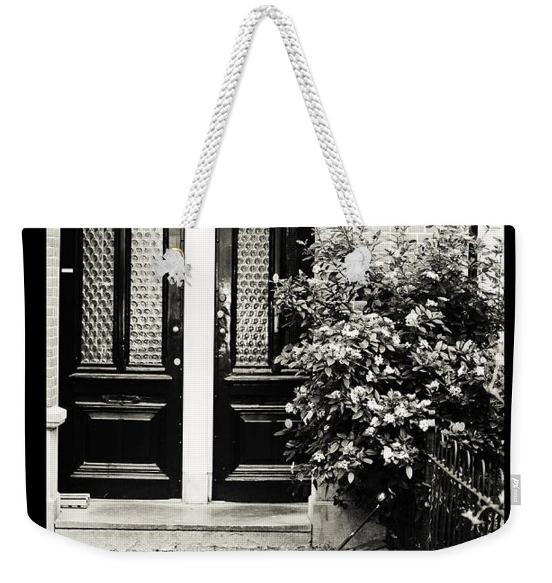 Jenny Rainbow Fine Art Photography Weekender Tote Bag featuring the photograph Amsterdam Posters. Bloom at Entrance Door by Jenny Rainbow