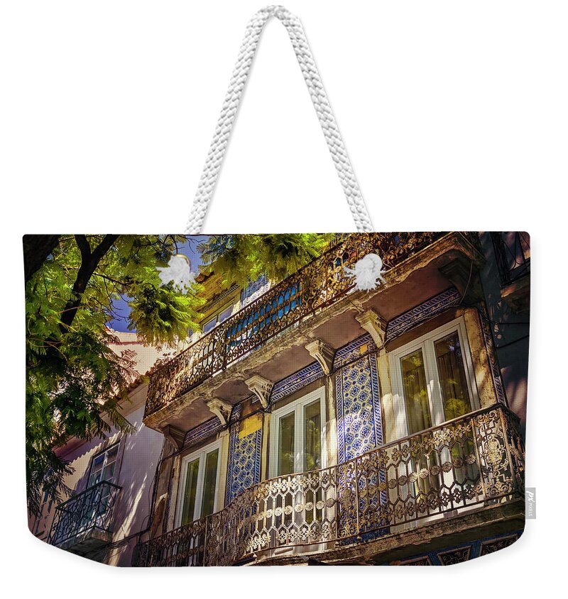 Lisbon Weekender Tote Bag featuring the photograph An Elegant Balcony in Lisbon Portugal by Carol Japp