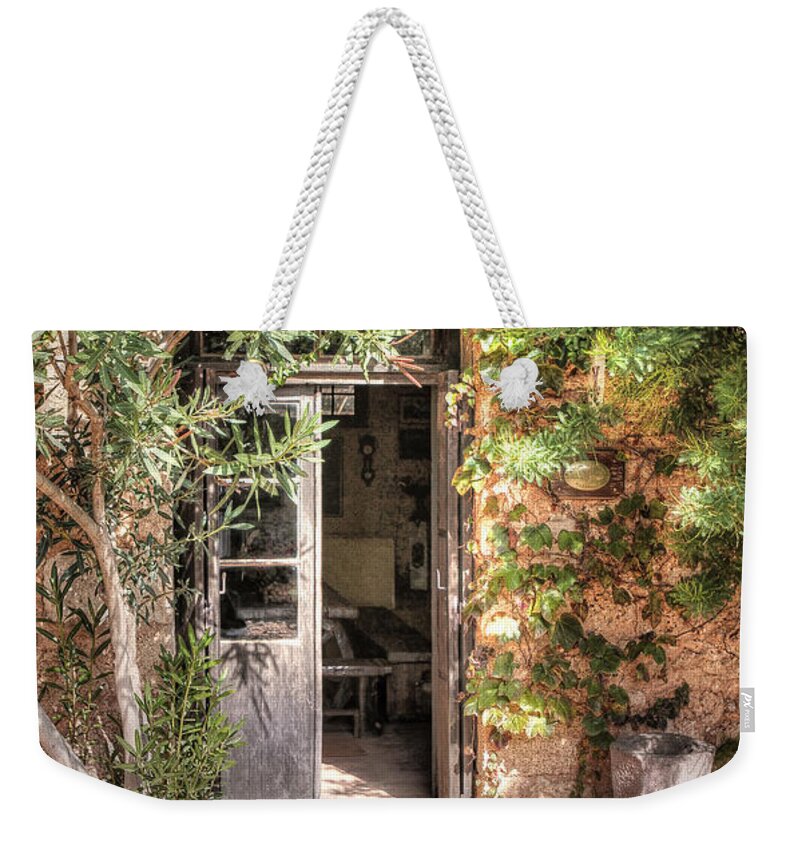 Europe Weekender Tote Bag featuring the photograph An Entrance in Santorini by Tom Prendergast