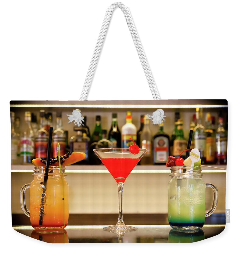 Martini Weekender Tote Bag featuring the photograph An italian drink by Alessandro Della Pietra