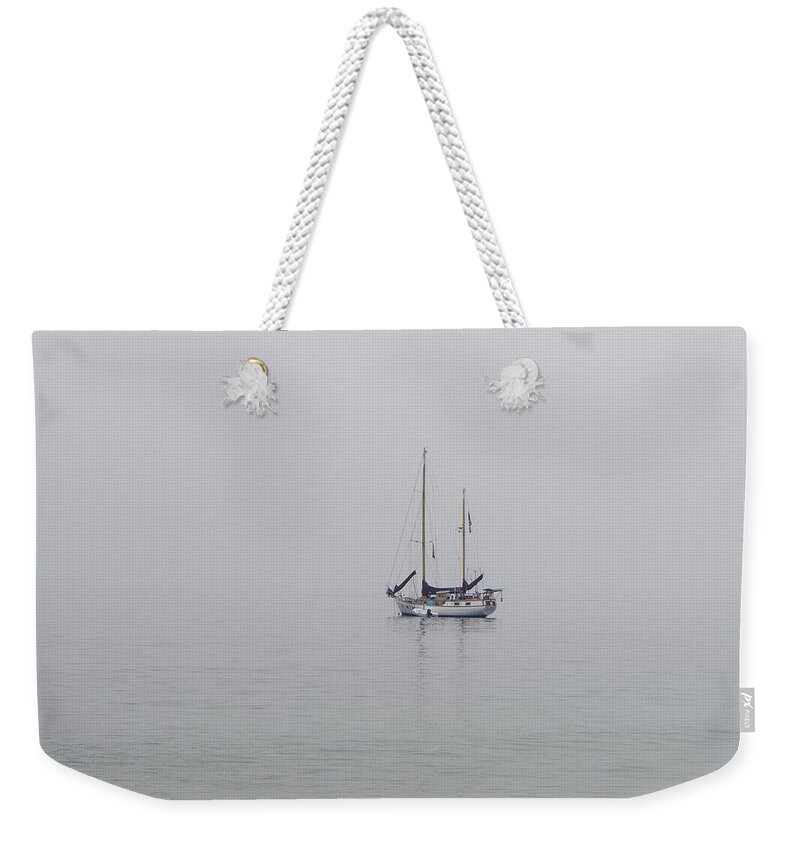 Boat Weekender Tote Bag featuring the photograph Anchored in the Mist by Derek Dean