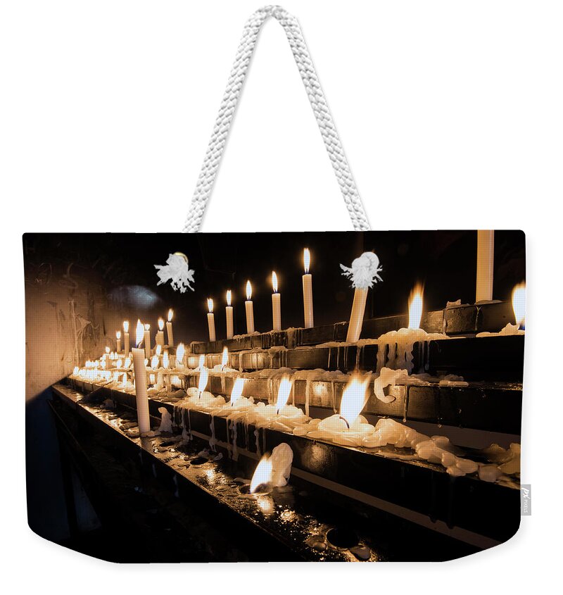 Candles Weekender Tote Bag featuring the photograph Andechs Prayer Candles by Matt Swinden