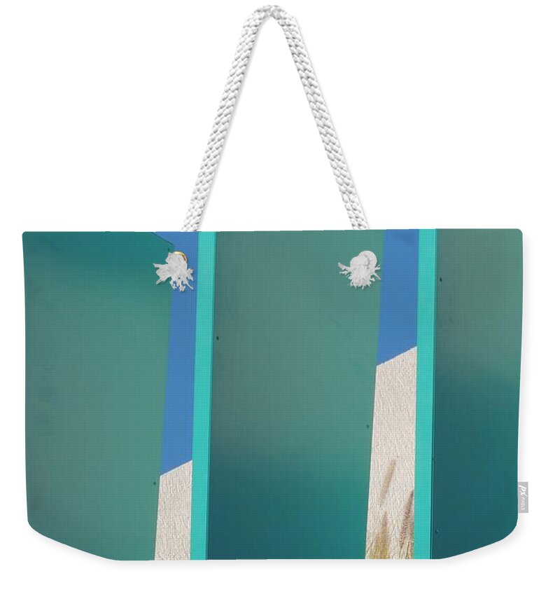 Geometric Weekender Tote Bag featuring the photograph Verticals on Broadbeach. by Denise Clark