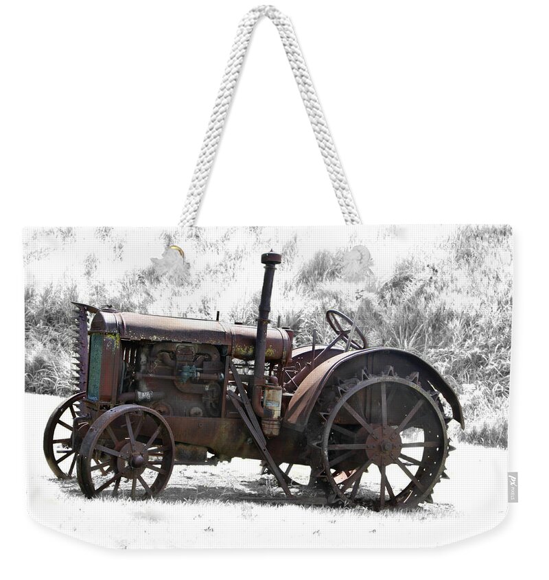 Antique Iron Horse Weekender Tote Bag featuring the photograph Antique Iron Horse by Kathy M Krause