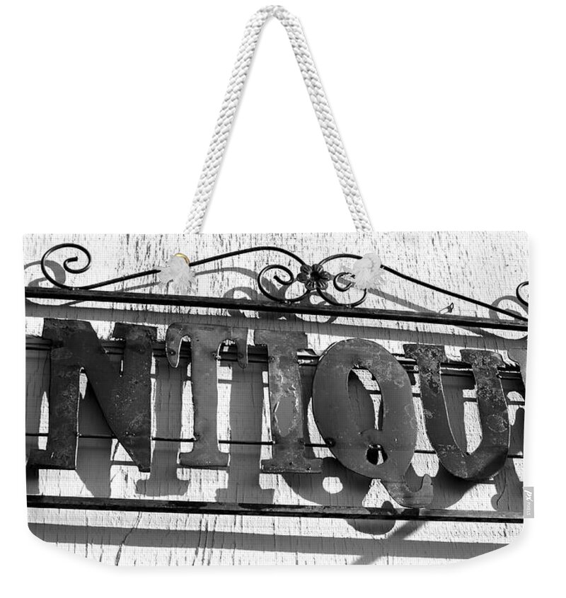 Antique Signs Weekender Tote Bag featuring the photograph Antiques store sign by Cathy Anderson