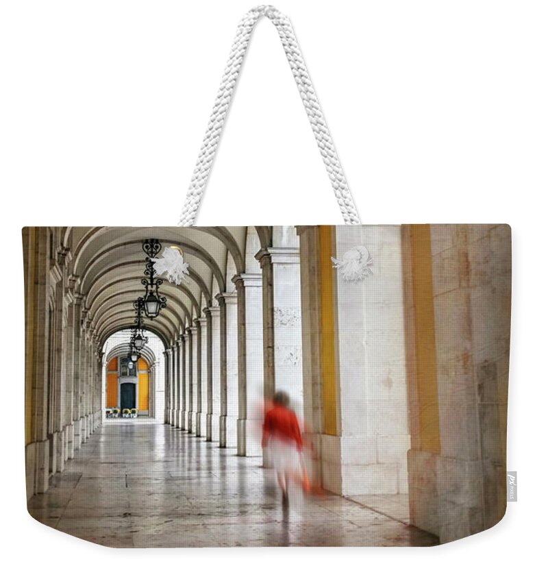 Lisbon Weekender Tote Bag featuring the photograph Arched Walkway Terreiro do Paco Lisbon Portugal by Carol Japp