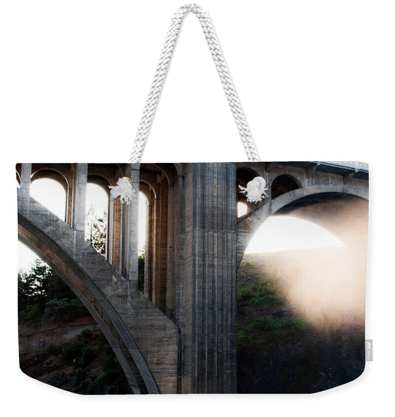 Spokane Weekender Tote Bag featuring the photograph Arches by Troy Stapek