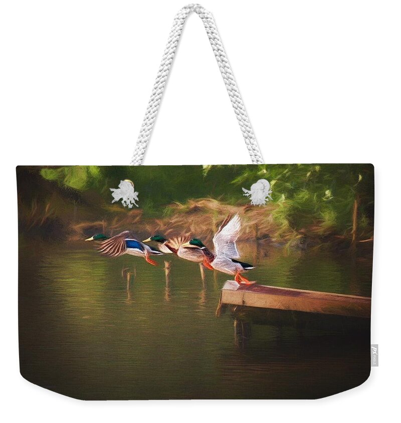 Duck Weekender Tote Bag featuring the photograph Around the river by Jaroslav Buna