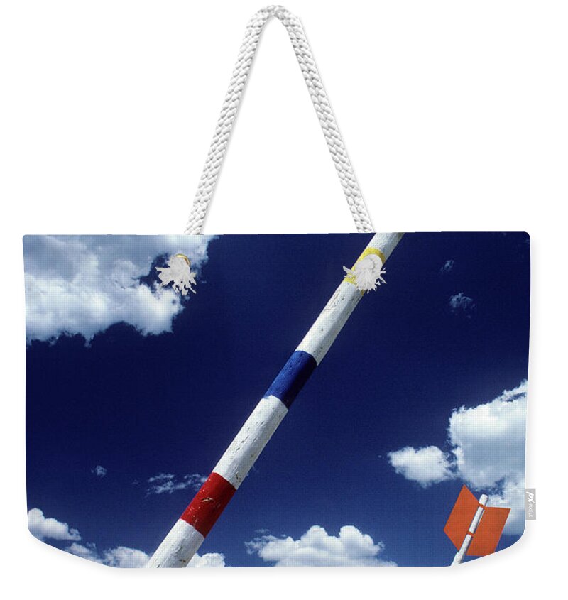 America West Weekender Tote Bag featuring the photograph Arrows by Steve Williams