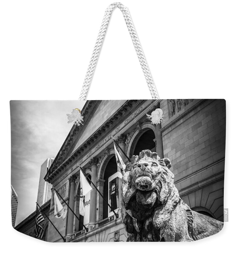America Weekender Tote Bag featuring the photograph Art Institute of Chicago Lion Statue in Black and White by Paul Velgos