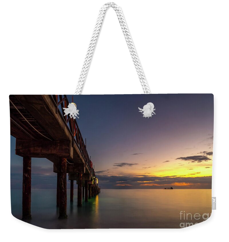  Weekender Tote Bag featuring the photograph As The Sun Goes by Hugh Walker