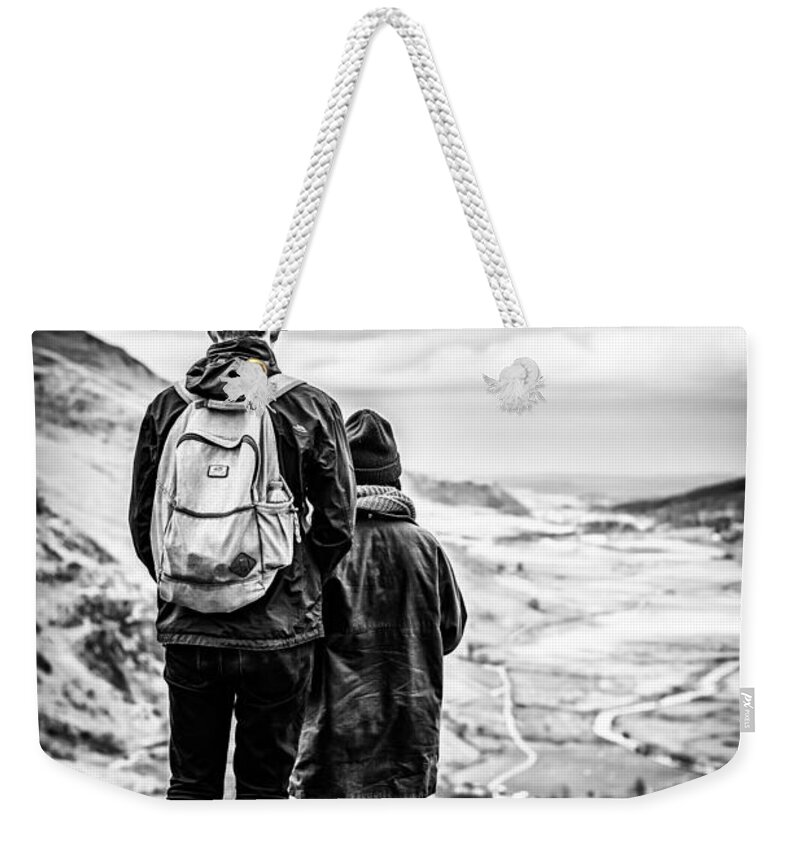 Mountain Weekender Tote Bag featuring the photograph On the Edge by Nick Bywater