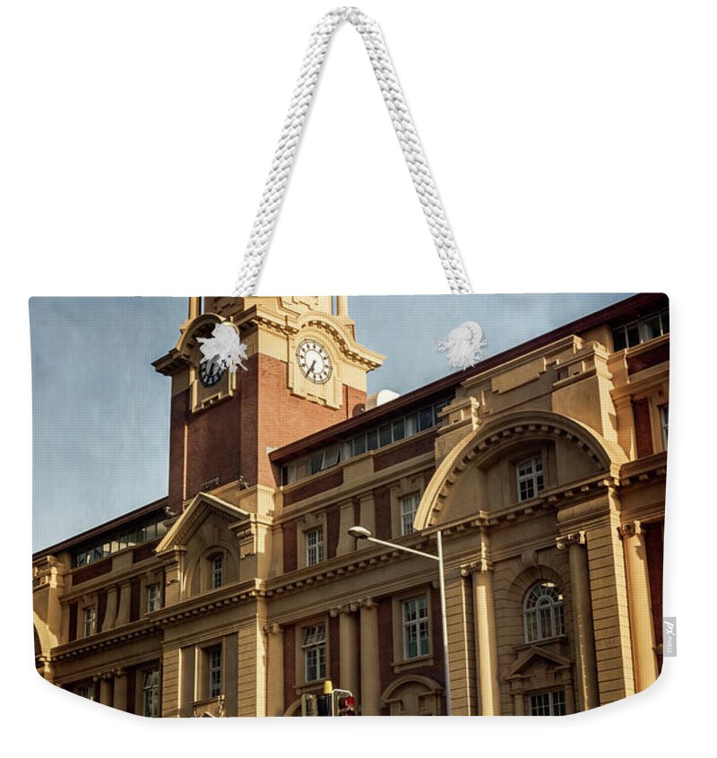 Joan Carroll Weekender Tote Bag featuring the photograph Auckland New Zealand Ferry Building by Joan Carroll