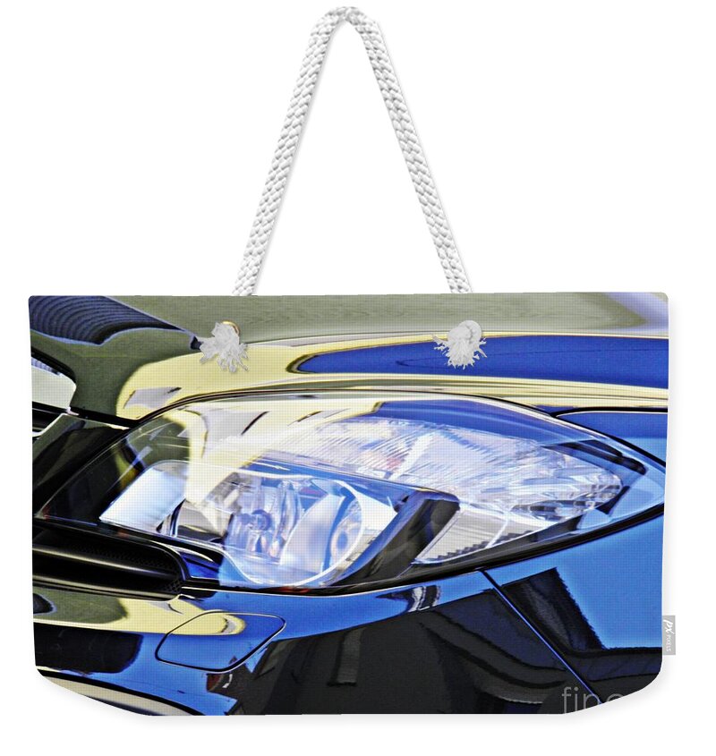 Headlight Weekender Tote Bag featuring the photograph Auto Headlight 191 by Sarah Loft