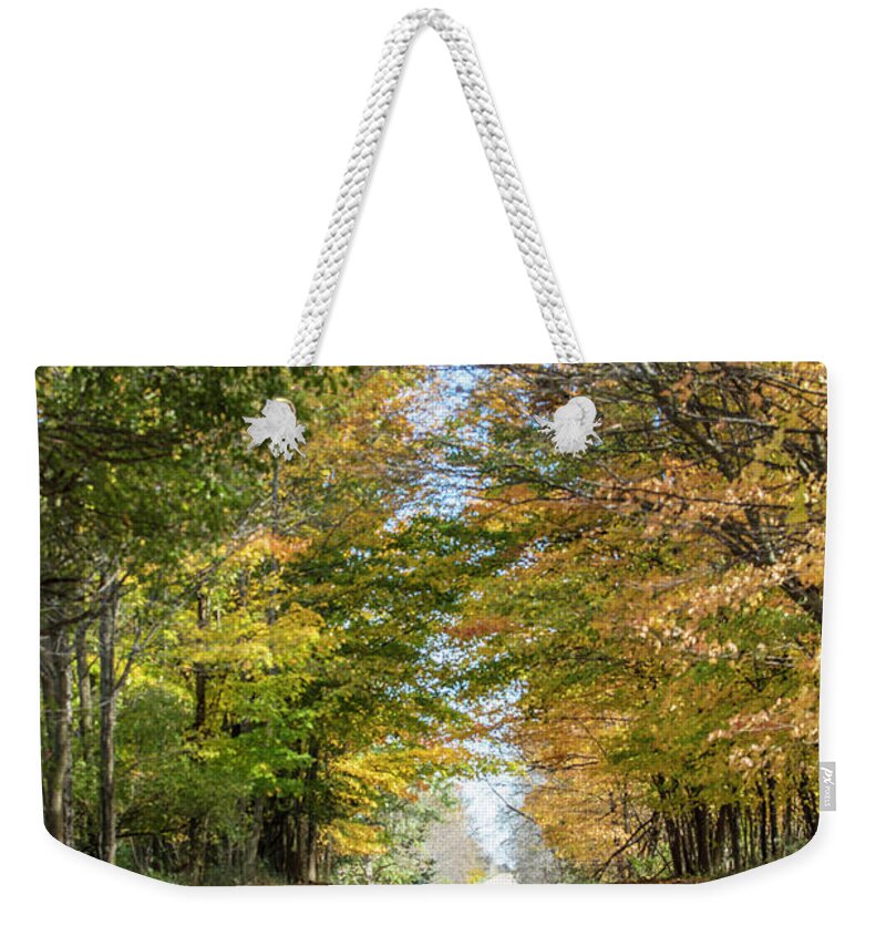 Autumn Weekender Tote Bag featuring the photograph Autumn Backroad by John McGraw
