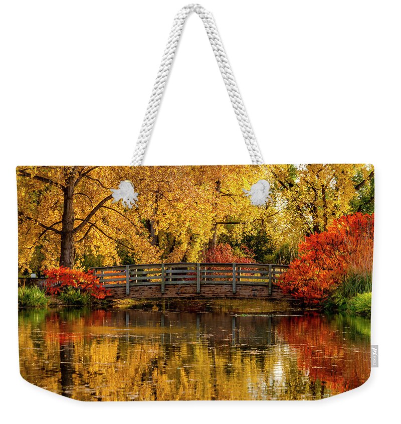 Hudson Gardens Weekender Tote Bag featuring the photograph Autumn Color by the Pond by Teri Virbickis
