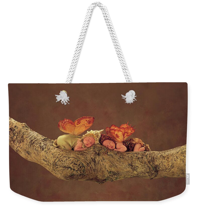 Fairies Weekender Tote Bag featuring the photograph Autumn Fairies by Anne Geddes