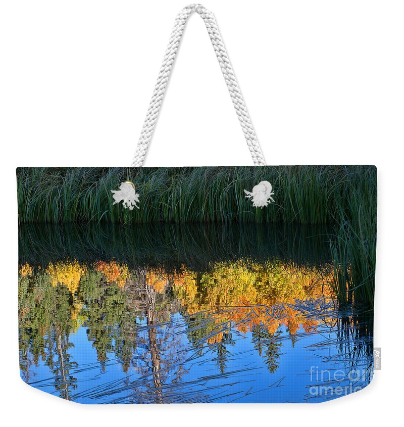 Fall Colors Weekender Tote Bag featuring the photograph Autumn on the Lake by Jim Garrison
