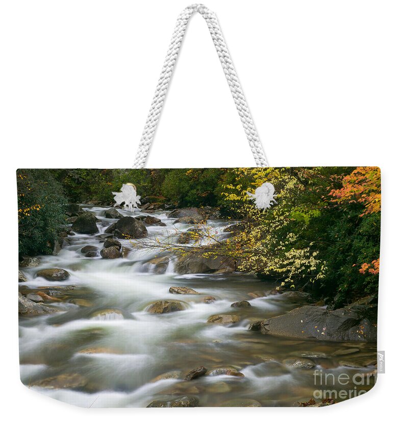 Clarence Holmes Weekender Tote Bag featuring the photograph Autumn River Cascades II by Clarence Holmes