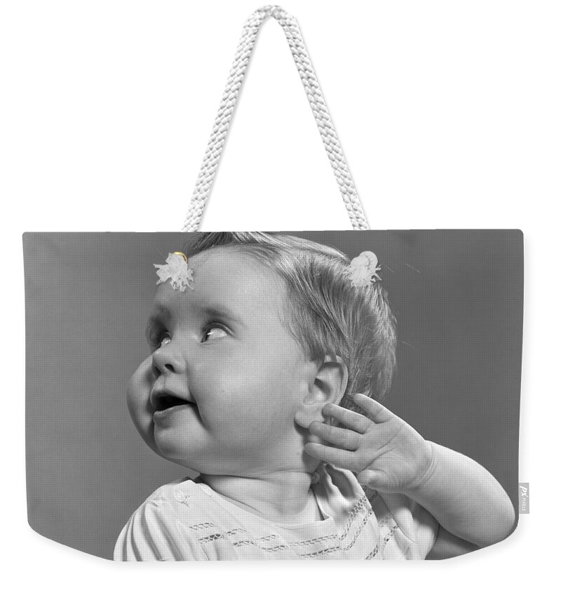 1940s Weekender Tote Bag featuring the photograph Baby Girl, C.1940-50s by H. Armstrong Roberts/ClassicStock