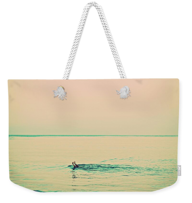 Surfing Weekender Tote Bag featuring the photograph Backstroke by Nik West