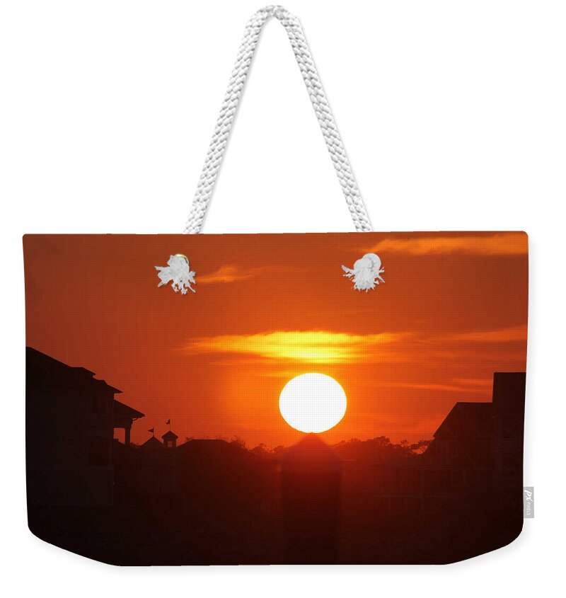 Sun Weekender Tote Bag featuring the photograph Balancing Sun by Robert Banach