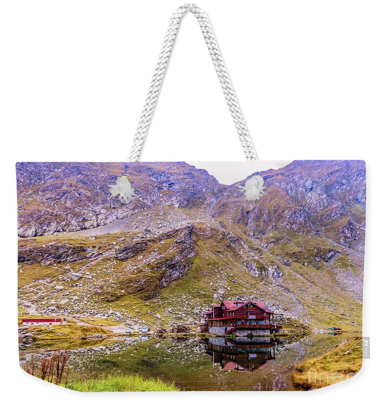 Mountains Weekender Tote Bag featuring the photograph Balea Lake in Romania by Claudia M Photography