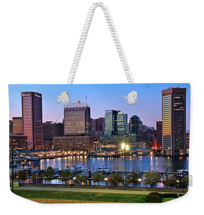 Baltimore Weekender Tote Bag featuring the photograph Baltimore at Dusk by Frozen in Time Fine Art Photography
