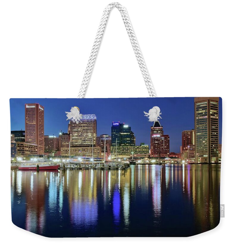 Baltimore Weekender Tote Bag featuring the photograph Baltimore Blue Hour by Frozen in Time Fine Art Photography