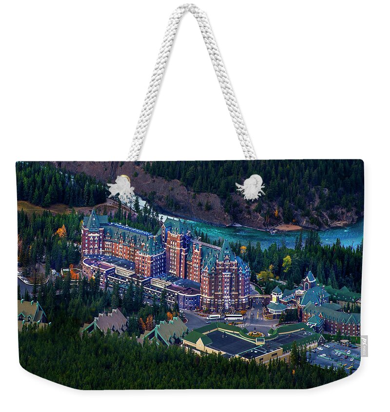 Golden Weekender Tote Bag featuring the photograph Banff Springs Hotel by John Poon