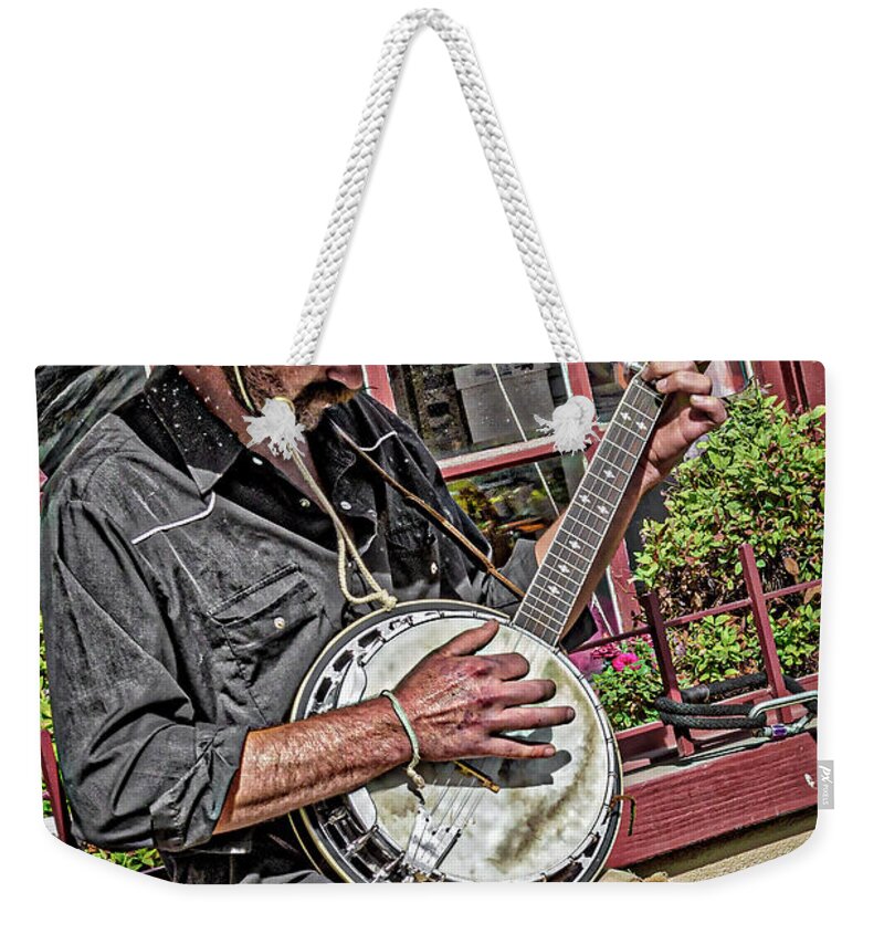 Banjo Weekender Tote Bag featuring the photograph Banjo Man Orange by Jim Thompson