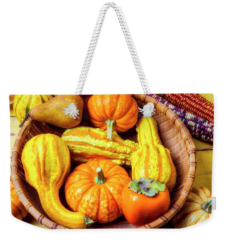 Basket Weekender Tote Bag featuring the photograph Basket Of Autumn Gourds And Fruits by Garry Gay
