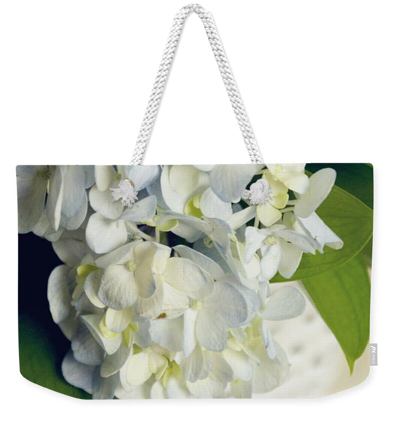  Weekender Tote Bag featuring the photograph Basket of blue hydrangeas by Cindy Garber Iverson