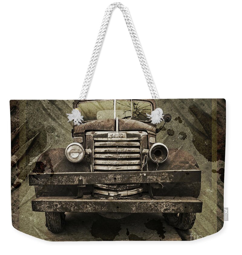 Battered Weekender Tote Bag featuring the photograph Battered by John Anderson