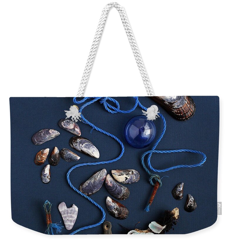 Beach Finds Weekender Tote Bag featuring the photograph Beach Finds in Blue by Art Block Collections