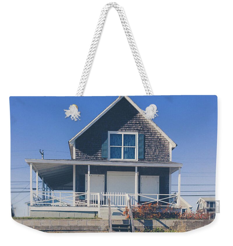 Wells Weekender Tote Bag featuring the photograph Beach front cottage by Edward Fielding