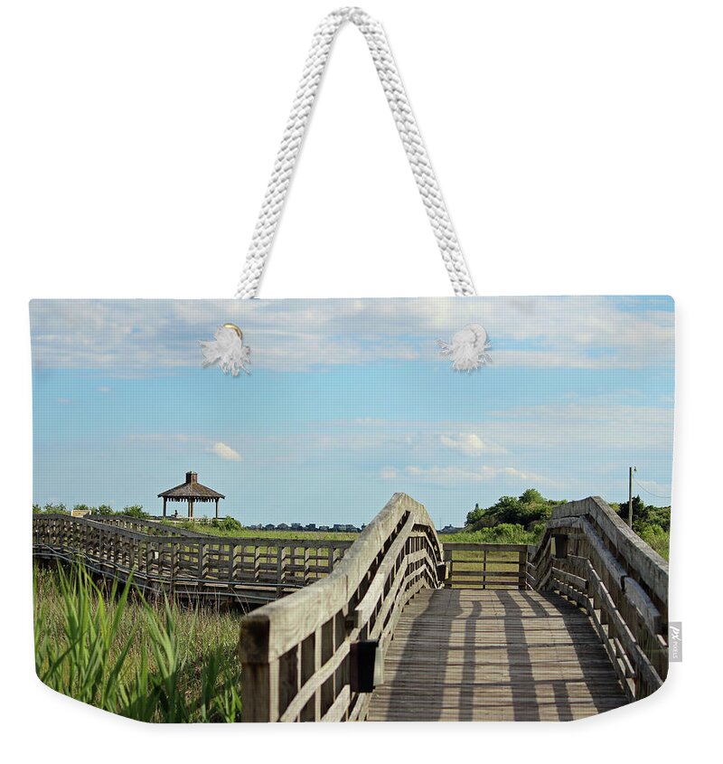 Southport Weekender Tote Bag featuring the photograph Beauty At The Boardwalk by Cynthia Guinn