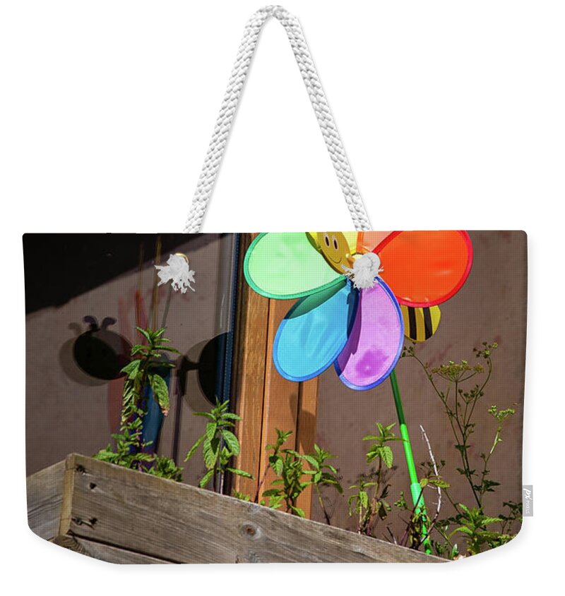 Buildings & Structures Weekender Tote Bag featuring the photograph Bee a Wind Spinner? by Geoff Smith