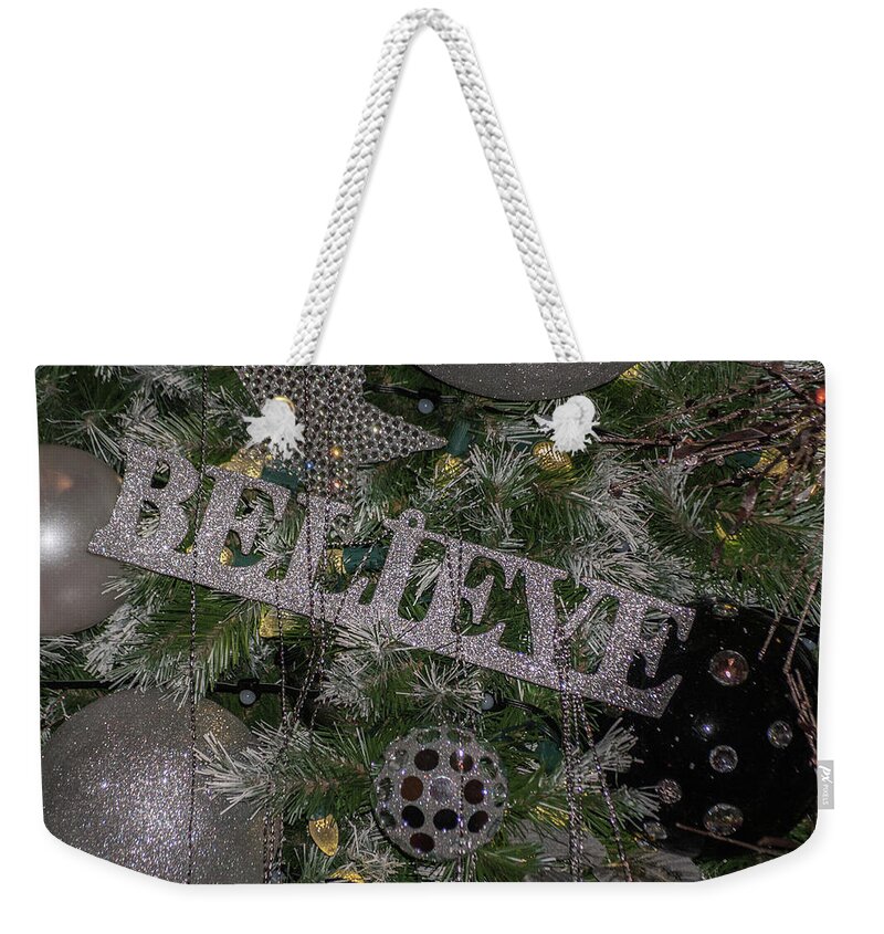 Christmas Weekender Tote Bag featuring the photograph Believe by Stewart Helberg