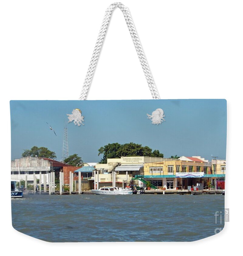Caribbean Weekender Tote Bag featuring the photograph Belize City Waterfront by Carol Bradley