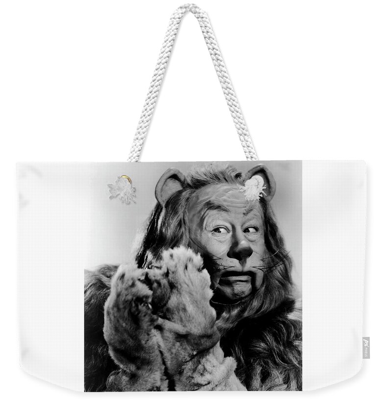 The Wizard Of Oz Weekender Tote Bag featuring the photograph Cowardly Lion in The Wizard of Oz by Doc Braham