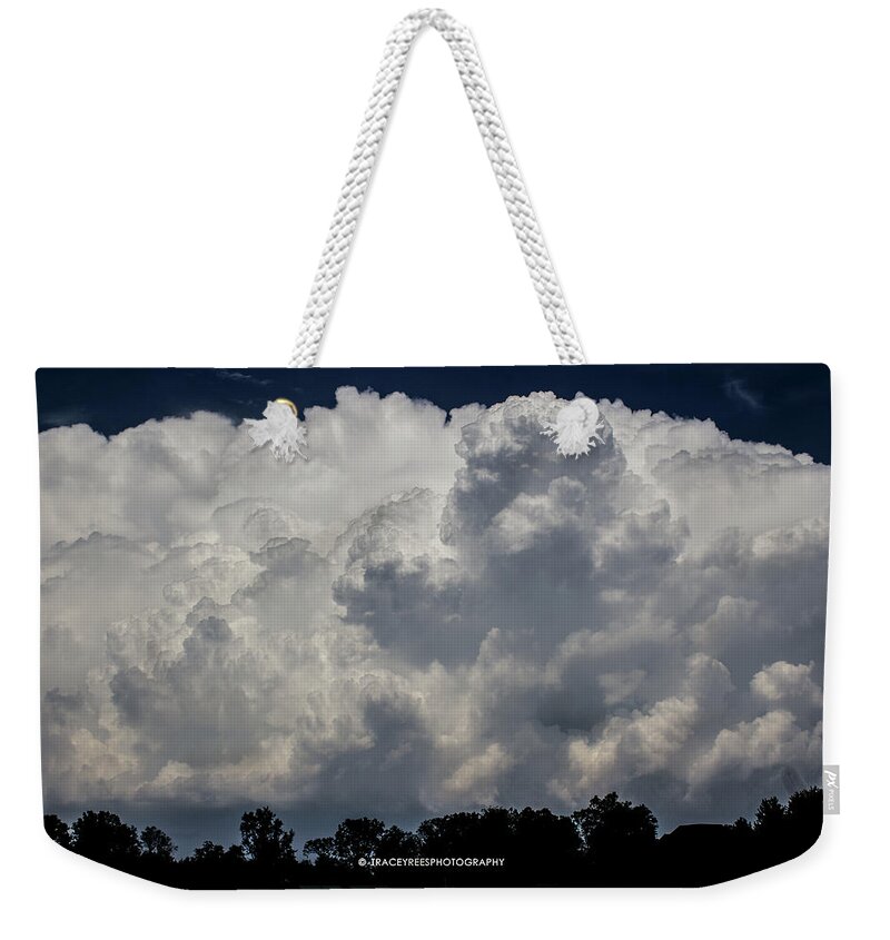 Cumulonimbus Clouds Weekender Tote Bag featuring the photograph Big clouds by Tracey Rees