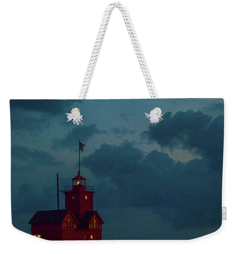 Michigan Weekender Tote Bag featuring the photograph Big Red Lighthouse Holland Michigan With Crescent Moon by Ken Figurski