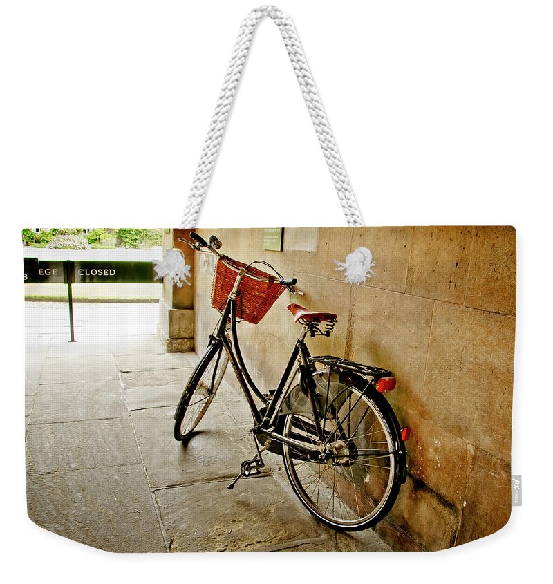 Christ's College Weekender Tote Bag featuring the photograph Bike at the school gate. by Elena Perelman