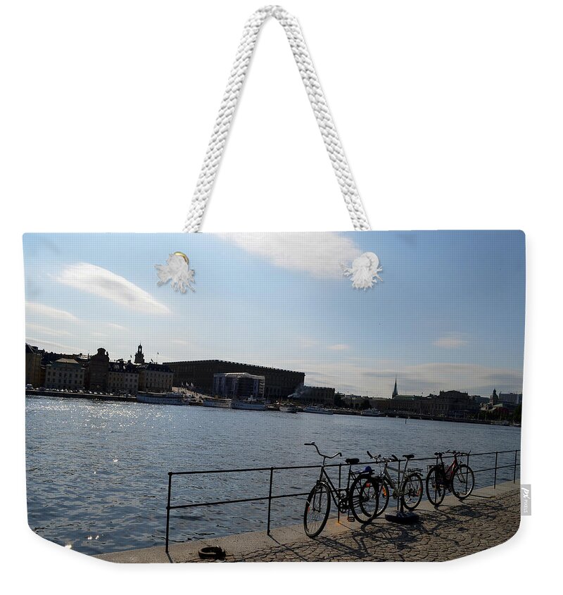 Bikes Weekender Tote Bag featuring the photograph Bikes in Stockholm by Erik Burg