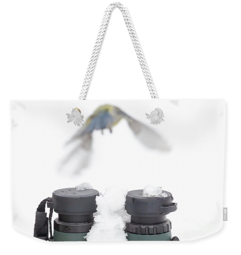 Bird Weekender Tote Bag featuring the photograph Bird watching concept in winter by Simon Bratt